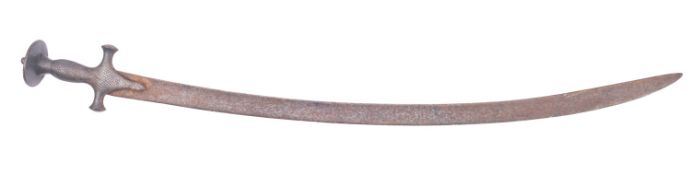A late 19th century tulwar, the curved single edge blade over a traditional steel grip,