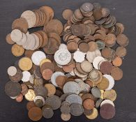 A quantity of mixed British and world coins, including Farthings and Irish coinage.