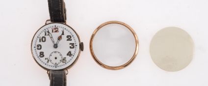 A vintage 9ct gold lady's wristwatch the round white dial with gilt and red Arabic numerals,
