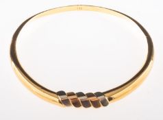 A tri-colour torque necklet, hinged, push-in clasp, clasp marked 18k, Citra, Italy,