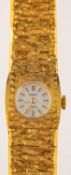 Regency a gold-plated lady's wristwatch the round dial with raised baton numerals and signed