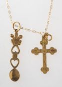 A Welsh 'love' spoon pendant with chain and a cross pendant, an openwork Welsh 'love' spoon pendant,