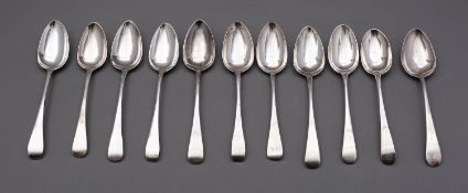 A matched set of eleven late 18th and early 19th century Old English pattern table spoons,