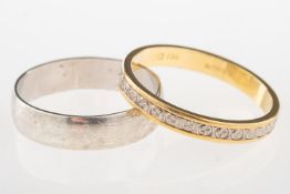 Two band designed rings, including an 18ct gold bi-colour band with central engraved decoration,