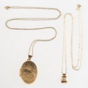 Two pendants with chains, including a 9ct gold oval engraved locket, UK hallmark, length approx. 3.