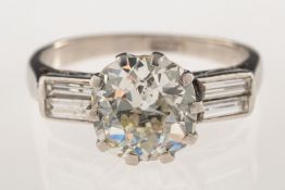 An Art Deco diamond ring, claw set to the centre with an old European-cut diamond, diamond approx.