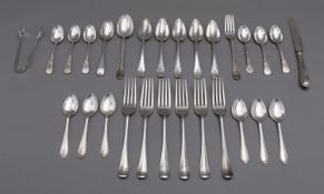 A mixed group of silver flatware including;