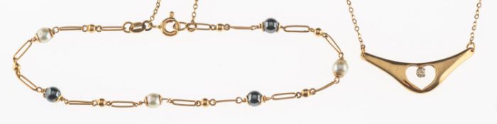A 9ct gold diamond necklace and a bracelet,