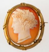 A cameo brooch, with carved figural lady's head, ornate mount, unmarked, measuring approx. 5.