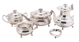 An Elizabeth II silver four piece tea and coffee service by Cooper Brothers & Sons Ltd,