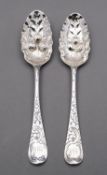 A pair of George II berry spoons by Ebenezer Coker, London 1747, 140gms.(4.5ozs.