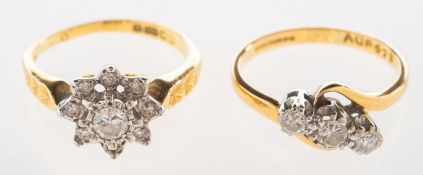 Two 18ct gold diamond rings,