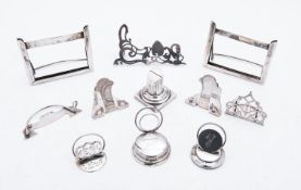 A mixed group of silver menu holders and stands including;
