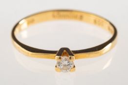 Boodles. An 18ct gold diamond ring, set with a single small brilliant-cut diamond, diamond approx.