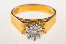 An 18ct gold 1970's diamond ring, set with a brilliant-cut diamond in an illusion setting,