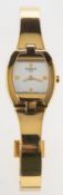Tissot a gold-plated lady's wristwatch the silvered cushion dial signed Tissot 1853 and having gold