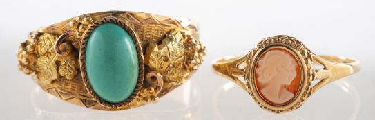 An Arizona Gold turquoise ring and a cameo ring,