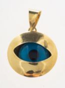 An 'evil' eye pendant, of circular form with a blue moveable eye, marked to verso 585, Melike, C924,