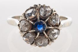 An Edwardian sapphire and diamond cluster ring,