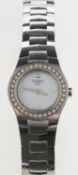 Tissot a lady's stainless-steel wristwatch the round mother-of-pearl dial signed Tissot,