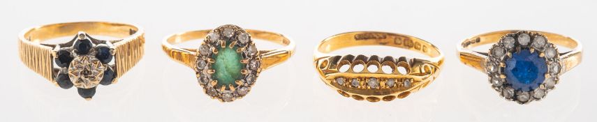 A group of four rings, including an 18ct gold five stone ring set with graduated old-cut diamonds,