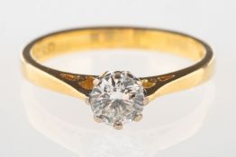An 18ct gold diamond solitaire, claw set with a brilliant-cut diamond, diamond approx. 0.