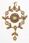 A Victorian peridot and seed pearl pendant brooch,