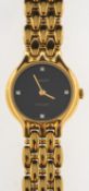 Tissot Stylist a gold-plated lady's wristwatch the round black dial with inset paste quarters and