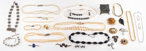 A mixed group of costume jewellery, including faux pearl necklaces,