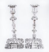 A pair of William IV silver candlesticks by Thomas, James & Nathaniel Creswick, Sheffield 1832,