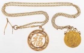 A chain with three pendants, a curb chain, marked 14KG near clasp, length approx. 67.