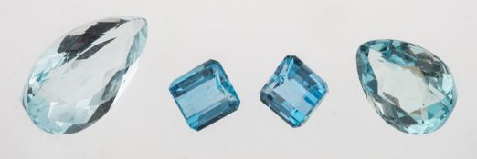 A group of four loose semi-precious gemstones including:- A loose pear-shaped aquamarine, approx. 3.