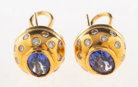 A pair of tanzanite and diamond earrings,