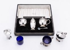 An Elizabeth II cased Lindisfarne design silver cruet set by Reid and Son Ltd, Birmingham 1956,