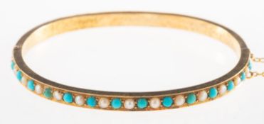 A Victorian turquoise and seed pearl bangle,