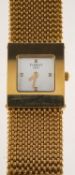 Tissot an 18ct gold lady's Gold Collection wristwatch the square silvered dial signed Tissot,