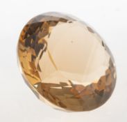 A loose circular mixed-cut citrine, approx. 334.0 carats.