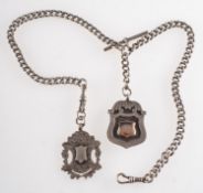A silver pocket watch chain with two ornate fobs, T-bar, UK hallmarks, length approx. 41.0cm, 64.