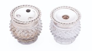 A pair of Georgian silver and glass hobnail inkwells by W.