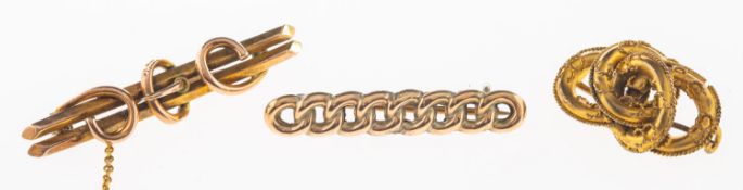 A group of three antique brooches, including a 9ct gold bar brooch in the form of intertwined links,