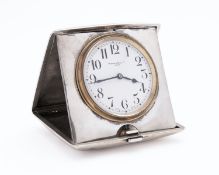 A George V silver cased travel clock by Mappin & Webb, Birmingham 1913, of square form,