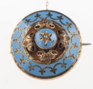 A Victorian mourning brooch, of circular form, star set to the centre with a seed pearl,