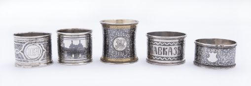 Five Russian late 19th century and early 20th century niello decorated silver napkin rings,