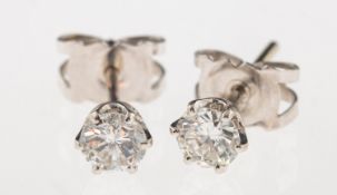 A pair of 18ct gold diamond studs, each set with a brilliant-cut diamond, diamonds approx. 0.