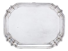 A George V silver salver by Walker and Hall, Sheffield 1912, of canted rectangular form,