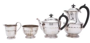 A George V four piece silver tea service by Viner's Ltd, Sheffield 1832, comprising; a tea pot,