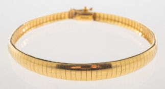 A herringbone designed bracelet, a graduated articulated bracelet,