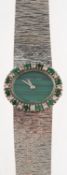 Bueche-Girod a 9K gold with inset diamond and emerald ladies wristwatch the oval green stone dial