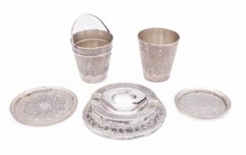 A mid 20th century Iranian silver beaker, Arab script mark, with a small silver ice bucket,