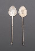 A pair of Edward VII silver butter spades by Holland, Aldwinckle & Slater, London 1902,